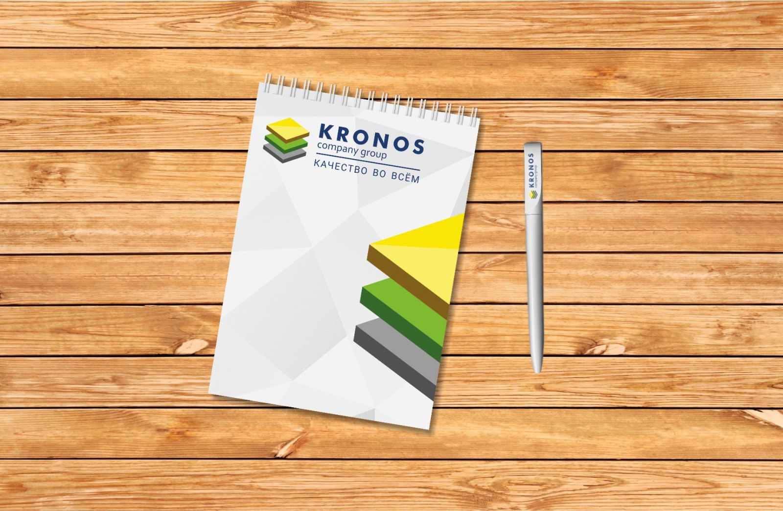 Блокнот и ручка с рекламой компании Kronos