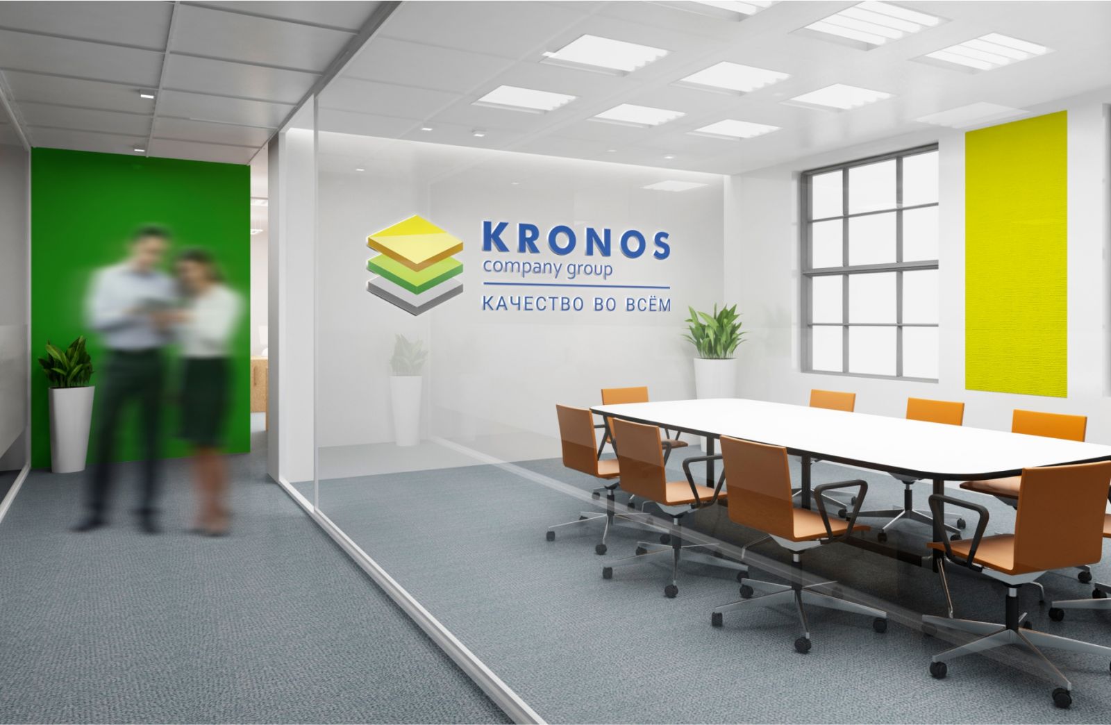 зал компании Kronos с вывеской на стене